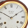 Roundhead Waisted Mahogany 8 Day Striking Mantel Clock